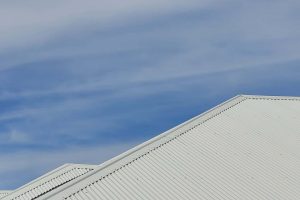 Ridge cap on top of a metal roof