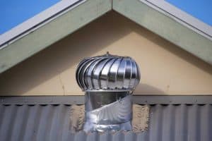 Whirlybird installed on a metal roof