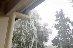 Leaking gutter at downpipe connection